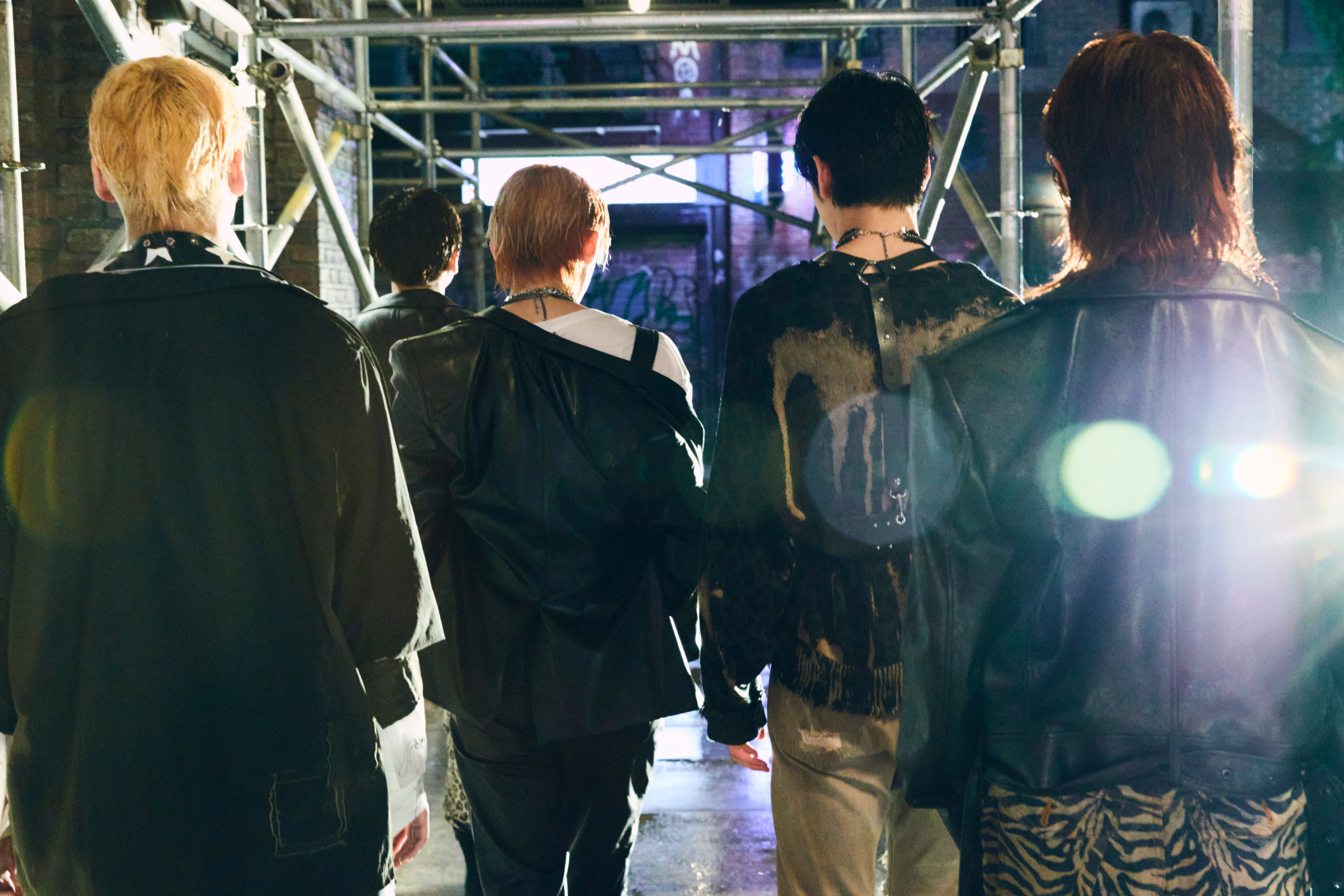 TXT Concept: Reality. All 5 members walking away from the camera, backs turned.
